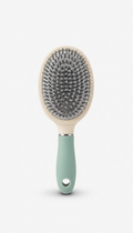 Gentle detangling brush with soft bristles